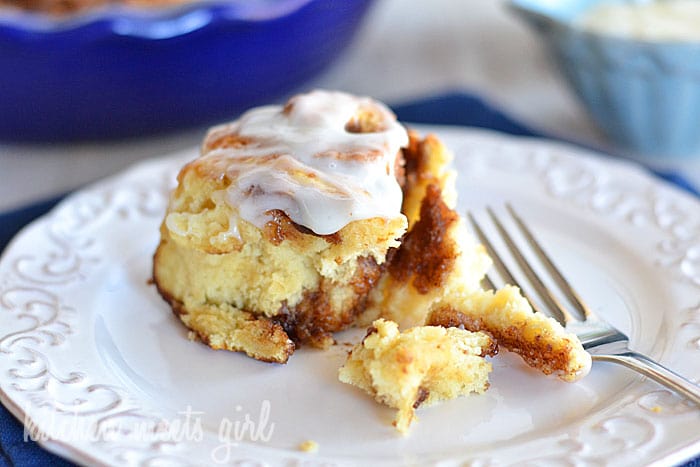 These quick cinnamon rolls go from kitchen to table in 45 minutes--no yeast required! Don't wait for a special occasion--dripping with a lovely buttermilk icing and filled with layer upon layer of cinnamon and cloves, this roll is a sweet treat you'll definitely want on your weekend rotation! #recipe #breakfast from @KitchenMeetsGir www.kitchenmeetsgirl.com