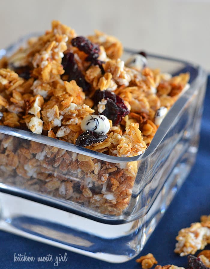 Honey-Vanilla Granola with blueberries and white chocolate from www.kitchenmeetsgirl.com--a perfect topping for yogurt, cereal, or just eating straight out of the bowl! #recipes #granola