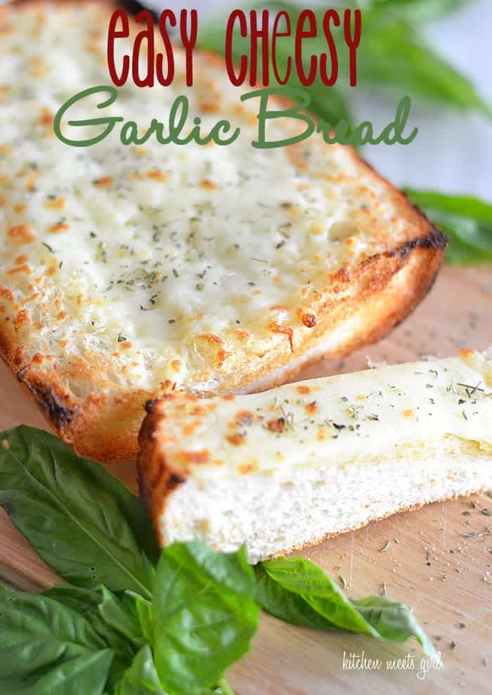 Easy Cheesy Garlic bread on kitchenmeetsgirl.com - don't buy those presliced loaves from your grocer when you can make a loaf like this at home! So gooey and cheesy and perfectly seasoned! #recipes #bread