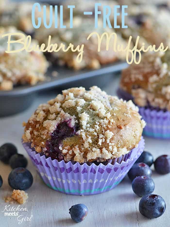 Guilt Free Blueberry Muffin from www.kitchenmeetsgirl.com - bursting with blueberries and a cinnamon struesel topping, these muffins are just 6 WW points+ each!