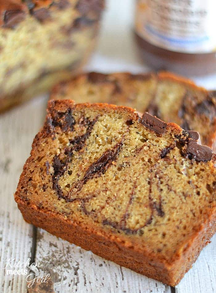 This dark chocolate peanut butter banana bread is the ultimate in decadence! www.kitchenmeetsgirl.com | #recipe #banana bread