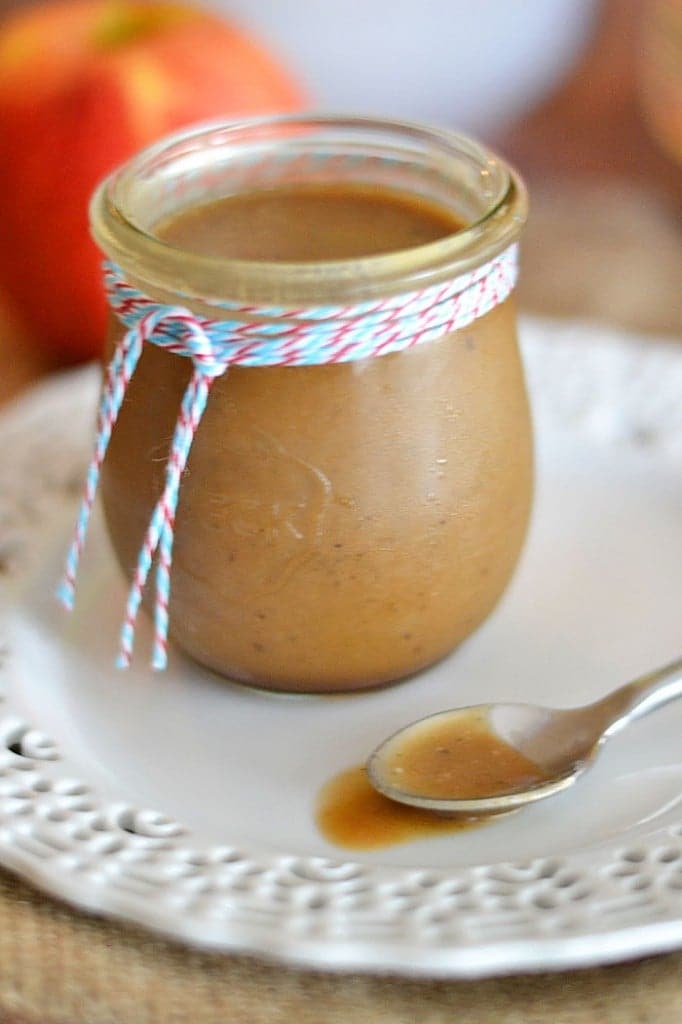 A super easy to make apple cider caramel sauce with vanilla bean flecks - heaven in a jar! Get the recipe at www.kitchenmeetsgirl.com #recipes #apple #caramel
