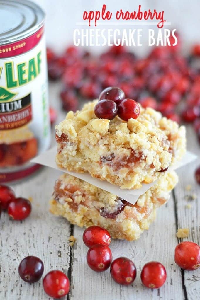 White chocolate, cream cheese, and pie filling are the perfect combination in these easy to make Apple Cranberry Cheesecake Bars.