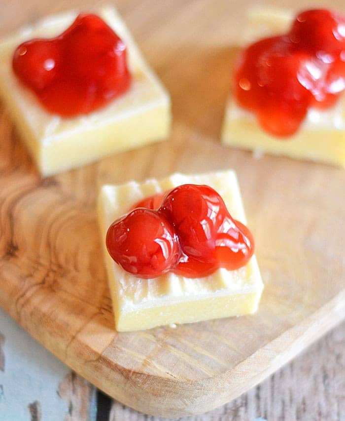 This White Chocolate Cherry Fudge requires only the microwave, and uses a special ingredient to make it extra light and fluffy! #recipe #fudge #white chocolate
