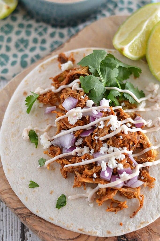 You need only a handful of ingredients to make these easy Slow Cooker Enchilada Tacos - making this the perfect dinner for busy nights!