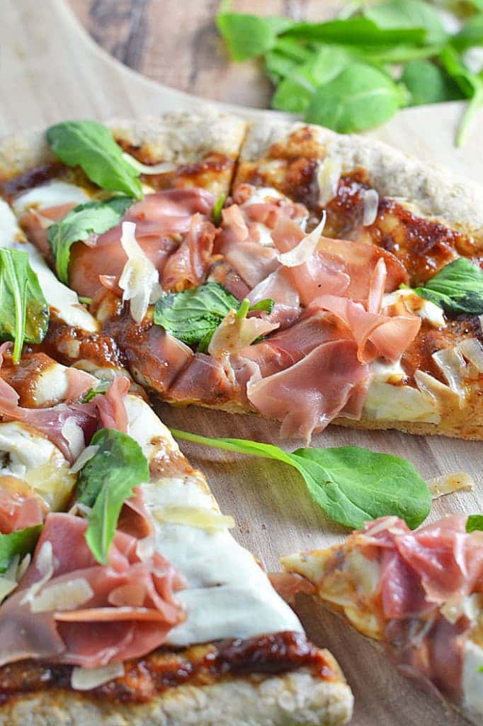 The slight sweetness of apple butter combines perfectly with the saltiness of prosciutto in this Apple Butter Pizza with Prosciutto and Arugula. It's our new favorite for pizza night!
