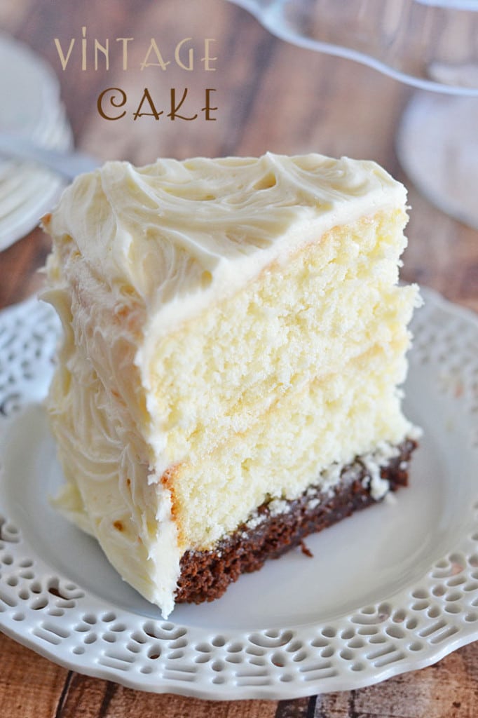 This Vintage Cake combines two layers of white cake, with a surprise brownie layer soaked in a decadent chocolate sauce. And the cream cheese frosting takes it right over the top!