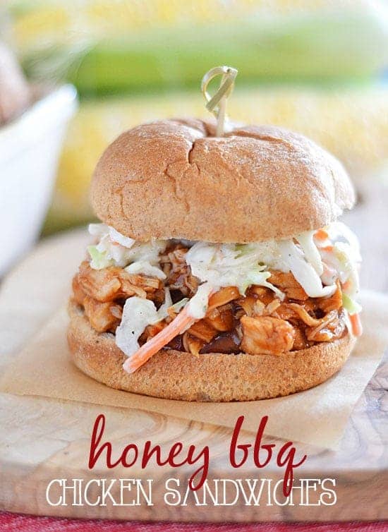 Dinner is no problem with these easy Honey BBQ Chicken Sandwiches topped with Ranch Slaw. Just a few ingredients and a slow cooker is all you need for this family friendly meal!