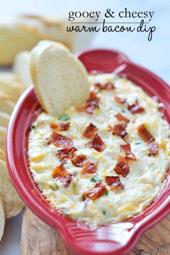 This Gooey and Cheesy Warm Bacon Dip comes together in less than 30 minutes and is the perfect crowd-pleasing appetizer!