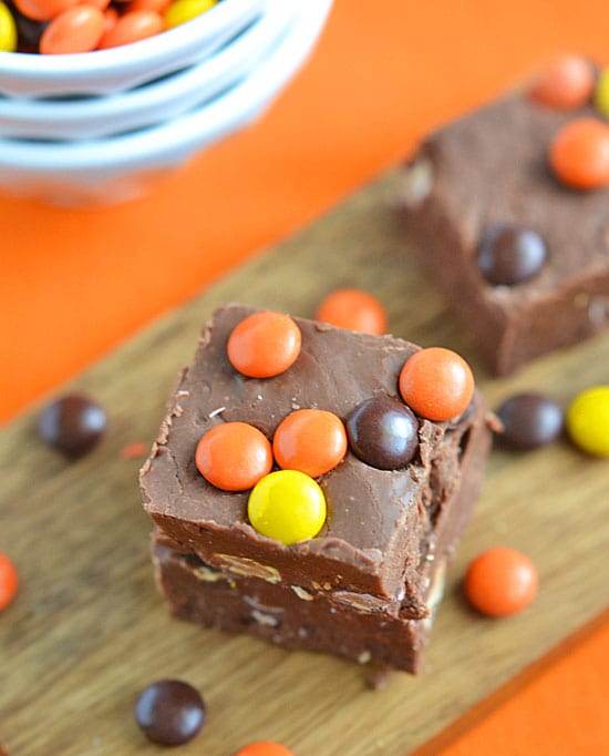In just a few short minutes {no candy thermometer needed!} you can have this Reese's Pieces No-Fail Fudge chilling and ready to go!