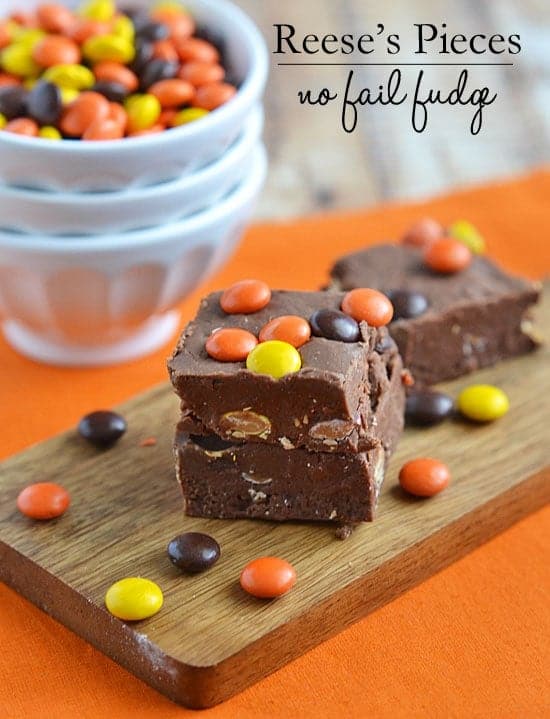 In just a few short minutes {no candy thermometer needed!} you can have this Reese's Pieces No-Fail Fudge chilling and ready to go!