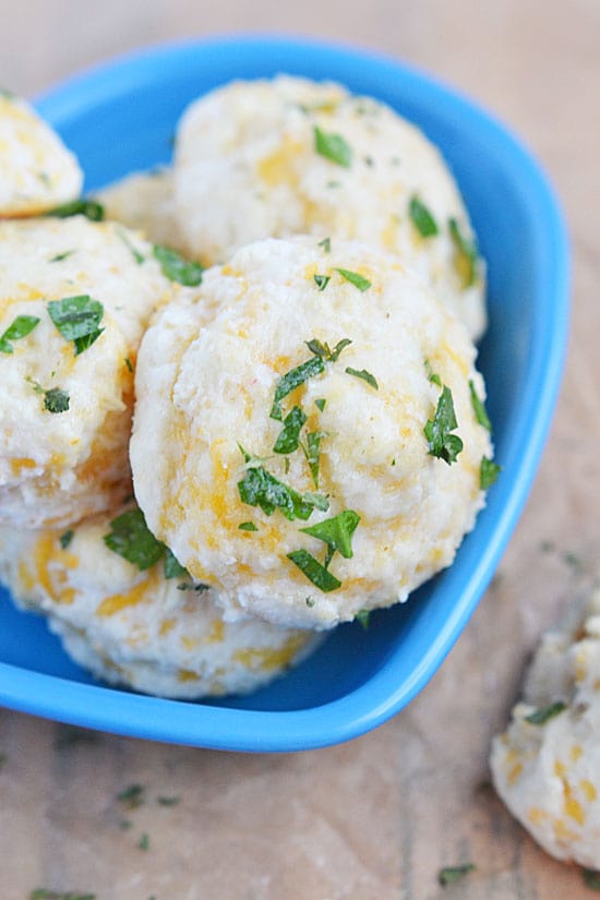 With just a few ingredients, five minutes to stir things together and get them on the baking sheet, and 10 minutes of baking time, you can have these Cheesy Garlic Biscuits on the table and ready to serve. 