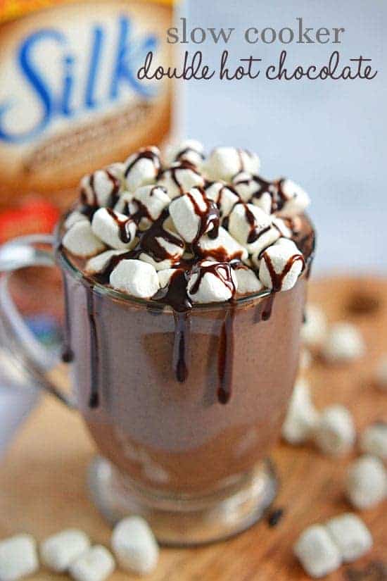 This Slow Cooker Double Hot Chocolate is thick and creamy and is perfect for a cool fall evening or winter's night. With a combination of Silk Chocolate Soymilk, half-and-half, sweetened condensed milk, and marshmallow cream, this warm beverage is a guilty indulgence you won't want to stop drinking!