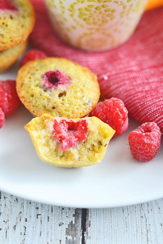 Pistachio and Raspberry Financiers are the perfect little sweet to serve when you want a fun pick me up. Made with a base of pistachio and topped with one tart raspberry, these elegant but easy treats are the perfect accompaniment to coffee or tea.