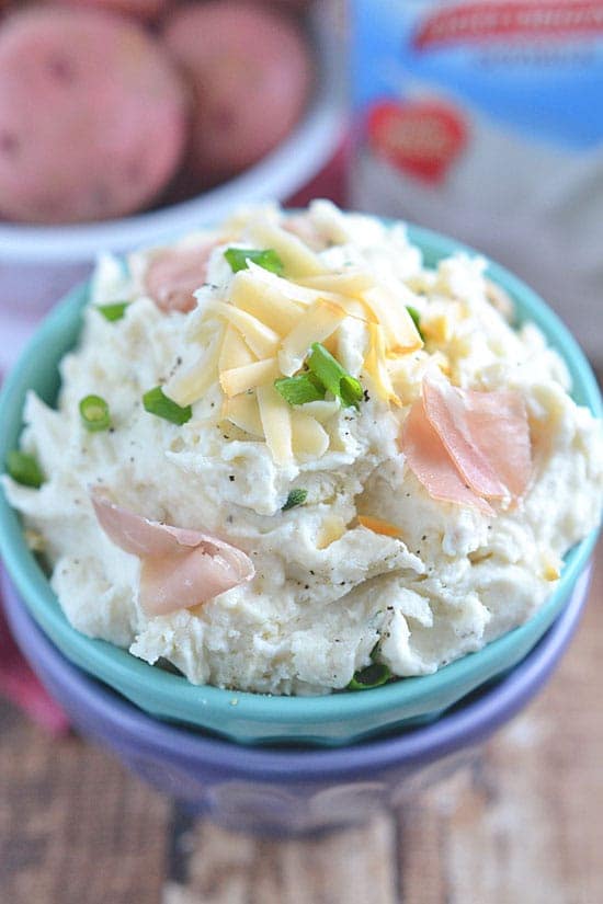This Smoked Gouda and Prosciutto Mashed Potato Casserole takes comfort food to the next level! This easy potato dish is perfect for your holiday table - or any day of the week!
