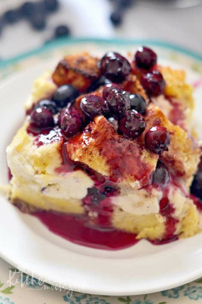 Blueberry Drizzled French Toast - meet your new favorite special occasion brunch recipe.  An easy overnight casserole with a blueberry syrup made with fresh blueberries and a special ingredient that takes this outrageously fantastic dish over the top!
