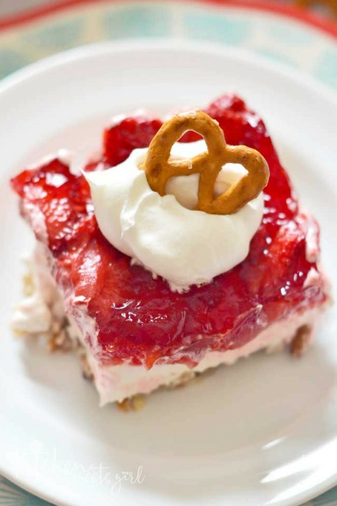 If you can't choose between sweet and salty treats - then this Strawberry Pretzel Dessert is for you!  A pretzel-pecan crust, topped with a sweet cream cheese layer, and finished off with a strawberry topping: this is one dessert that has something for everyone!